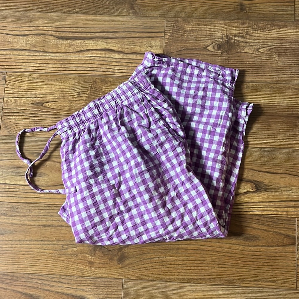 Woman within purple gingham capris